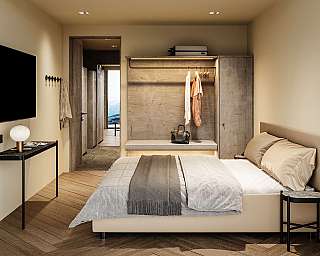 Modern eingerichtetes Schlafzimmer mit Doppelbett, Wanddekoration und Sitzbank.