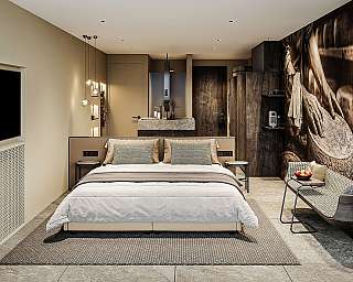 Chambre à coucher moderne aménagée avec lit, œuvre murale et banc