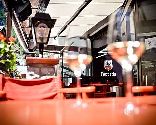 Café terrace with red chairs
