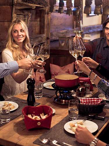 Friends toast at dinner